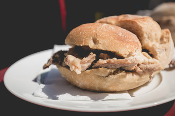 view of traditional portuguese pork beef sandwich bifana