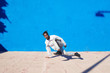 © guille Faingold/Stocksy - Young black man dancing on street