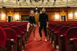 © Javier D?ez/Stocksy - Dancers in theatre auditorium