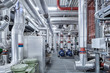© Westend61 - Pipeworks with insulation in a technical room