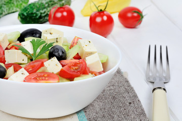 Poster - Vegetables salad with cheese in a bowl