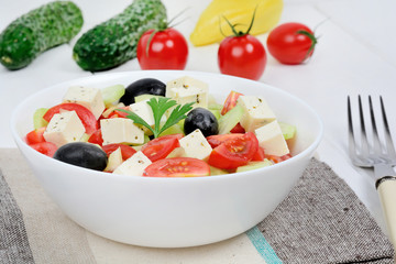 Poster - Vegetables salad with cheese in a bowl