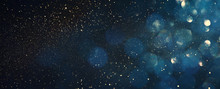 Background Of Abstract Glitter Lights. Blue, Gold And Black. De Focused. Banner