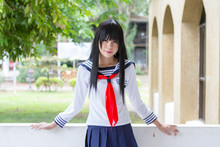 Asian Girl In Japanese School Uniform