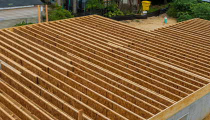 Wall Mural - A pattern of floor joist in a new construction