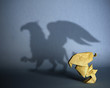 Concept of hidden potential. A paper figure of a chicks  that fills the shadow of a griffin. 3D illustration