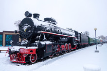 Steam Train In The Snow. Soviet Black And Red Locomotive.