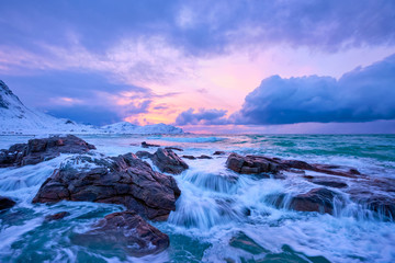 norwegian sea waves on rocky coast of lofoten islands, norway