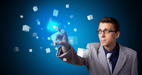 Poster - Man touching hologram screen displaying cube symbols