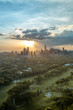 Golf course and Skyline of Manila, Philippines, in a beautiful sunset.