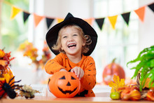 Child In Halloween Costume. Kids Trick Or Treat.