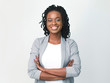 © Prostock-studio - Young Black Businesswoman Smiling At Camera Crossing Hands, Studio Shot