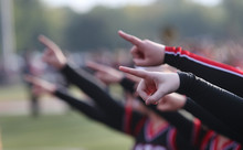 High School Cheerleaders Point As Part Of A Routine
