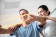 © Yakobchuk Olena - Hapy man with rubber band for fitness