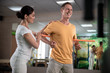 © Yakobchuk Olena - Happy male patient is doing special gymnastics