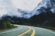 © CK - Road in the winter mountains in the background, mountian road in Washington,