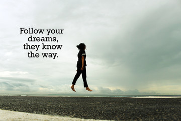 dream inspirational quote - follow your dreams, they know the way. with young woman walking and then