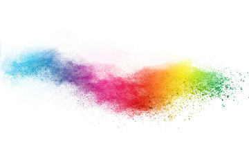 Freeze motion of colorful color powder exploding on white background.  Paint Holi.