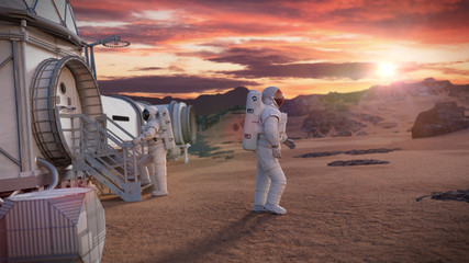 Wall Mural - astronauts around a mars base, research habitat on the surface of the red planet