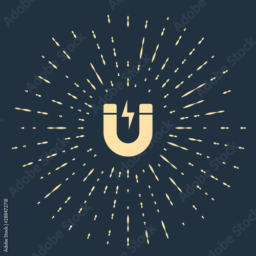 Fotografía Beige Magnet with lightning icon isolated on dark blue background