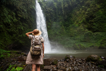 Poster - Woman near Nung Nung waterfal on Bali, Indonesia