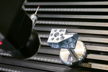 Poster - measuring machine with a manipulator arm. 3d measurement of a metal part. equipment for measuring th