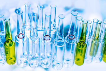 Poster - Test tubes for the laboratory. Glass flasks in medicine. Multi-colored test tubes for analysis. Sterilization of test tubes. Chemical experiments. DNA test. Experiments with reagents. Medical research