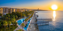 Sunset In Cyprus. The Sun Sets In The Mediterranean. Limassol At Sunset. Evening Panorama Of Limassol With Height. Mediterranean Evening Landscape. Holidays In Cyprus.