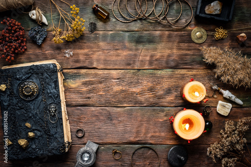 Cuadros en Lienzo Magic recipe book and a magic potions on a table