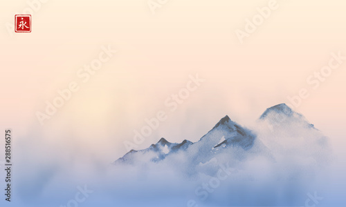 Far mountains over the dense fog and sunrise Canvas Print