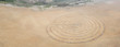 © ead72 - A circular rock labyrinth is found on the edge of the Pacific Ocean just north of San Francisco, California. Labyrinths symbolize the journey through life from birth to spiritual awakening to death.