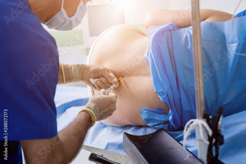 Fotomural Epidural anesthesia injections. Prepare for surgery