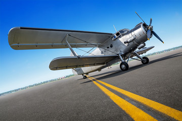 Wall Mural - historical airplane on a runway