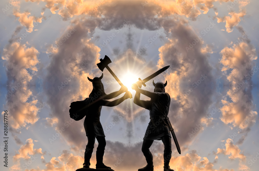 Two silhouettes of armed Viking warriors  with axe and sword against sky with circle of clouds and bright sun - obrazy, fototapety, plakaty 