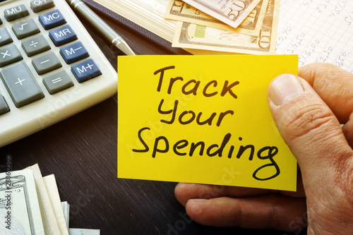 Fotomural Track your spending sign and book with home budget.