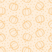 Seamless Pattern With Pumpkins And Hearts