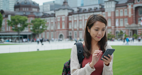 Canvas Print - Woman use of mobile phone in Tokyo city