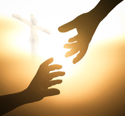 Hands with cross