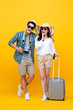 © Atstock Productions - Happy young Asian couple tourists in colorful yellow background
