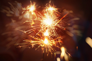 Poster - Abstract background blurry firework pyrotechnics and bokeh on the dark background for celebration concept