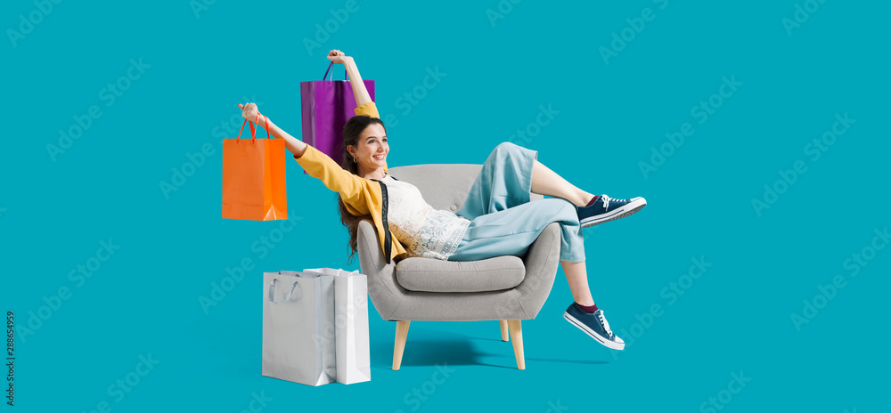 Cheerful shopaholic woman with shopping bags - obrazy, fototapety, plakaty 