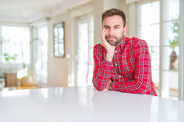 Wall Mural - Handsome man wearing colorful shirt thinking looking tired and bored with depression problems with crossed arms.