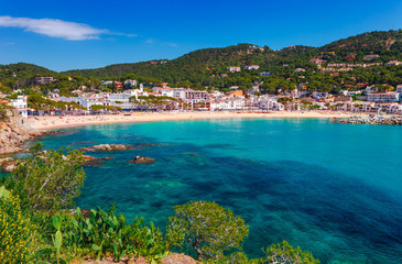 Wall Mural - Sea landscape Llafranc near Calella de Palafrugell, Catalonia, Barcelona, Spain. Scenic old town with nice sand beach and clear blue water in bay. Famous tourist destination in Costa Brava