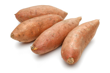 Sticker - Group of whole sweet potatoes isolated on white background