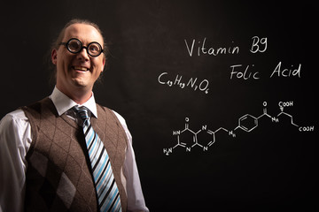 Sticker - Professor presenting handdrawn chemical formula of Vitamin B9