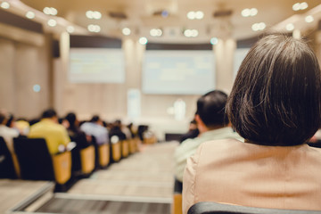 Wall Mural - Blurry of auditorium for shareholders' meeting or seminar event, many business people listening on the conference.