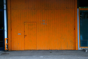 Metallic door to a factory