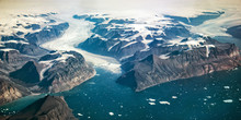 Western Coast Of Greenland, Aerial View Of Glacier,  Mountains And Ocean