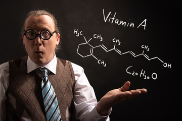 Sticker - Professor presenting handdrawn chemical formula of Vitamin A