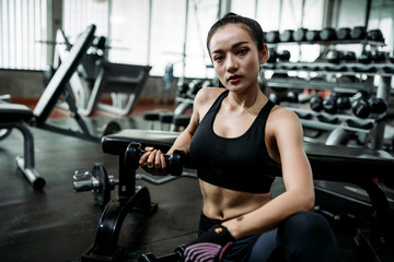 Wall Mural - Fitness women exercise in the gym